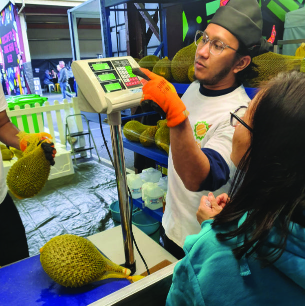 Produce being weighed and graded